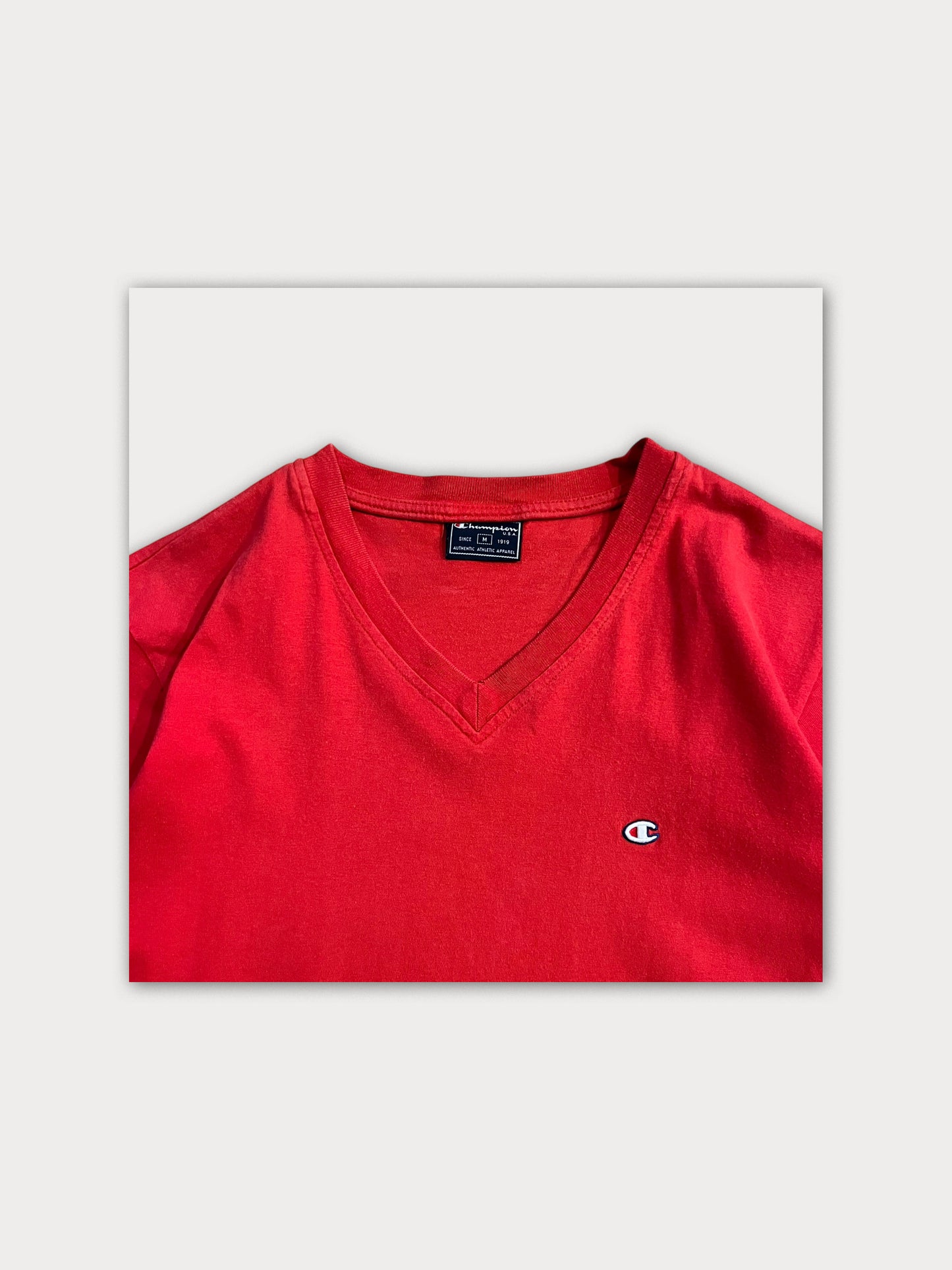 Champion Tee