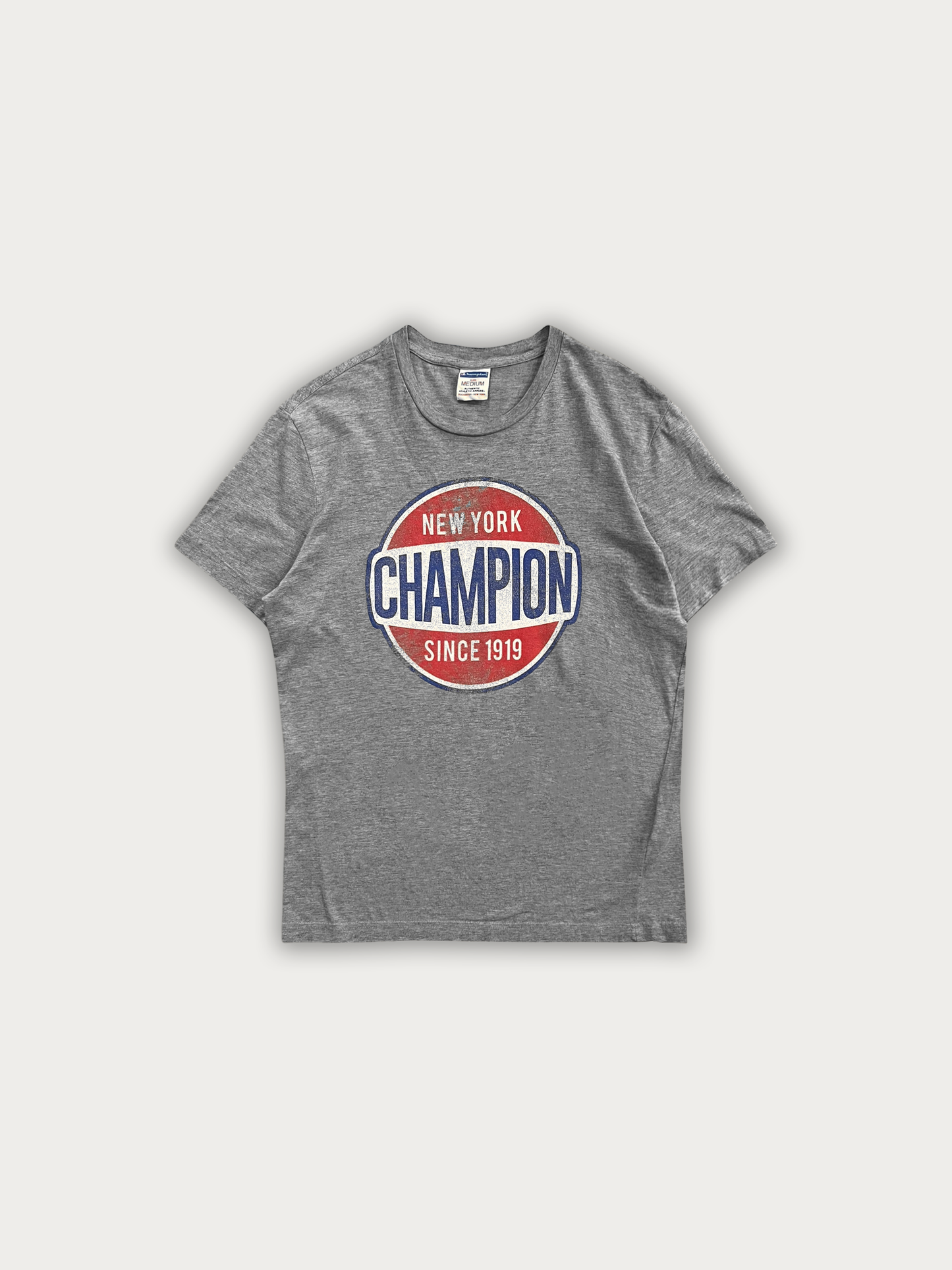 Champion Tee